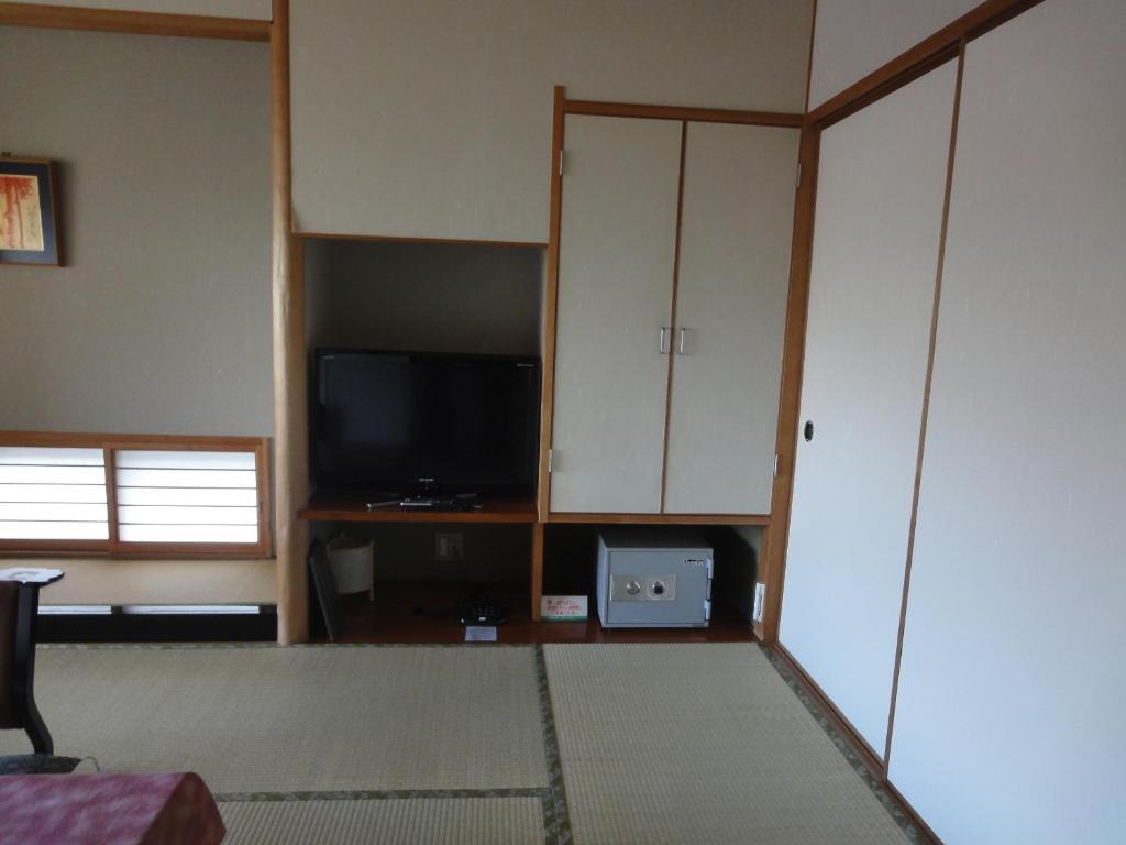 Jukeiso Hotell Hatsukaichi Rum bild