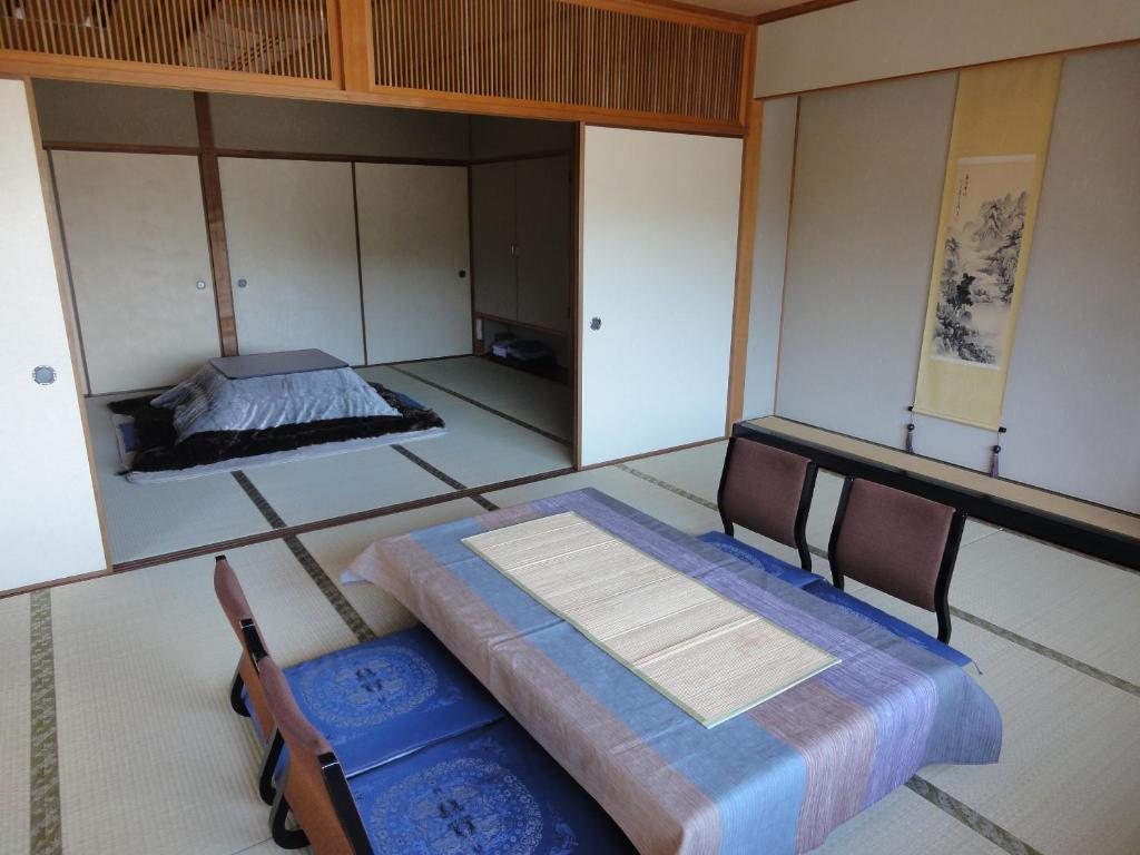 Jukeiso Hotell Hatsukaichi Rum bild